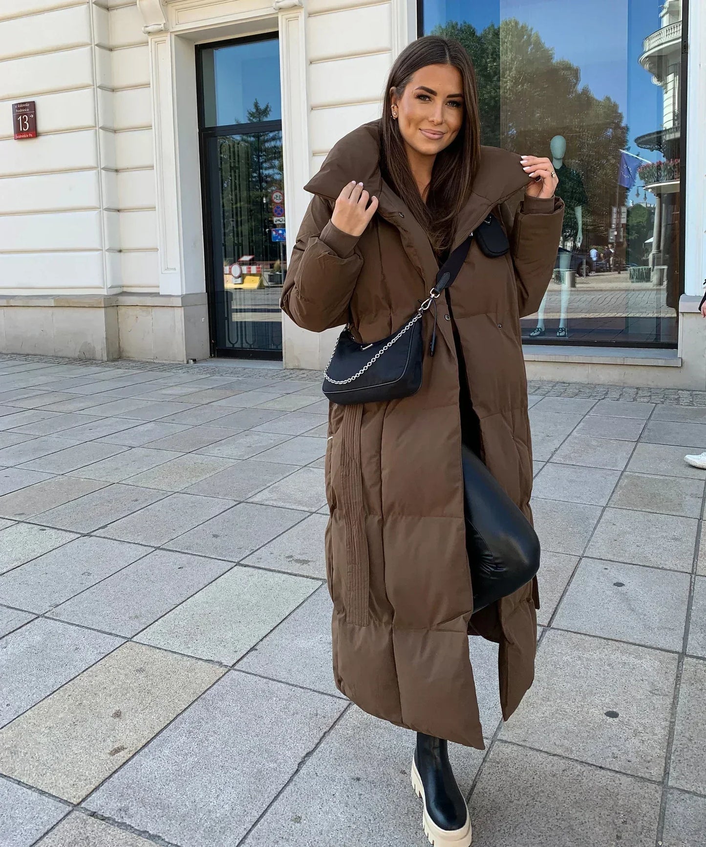 Wifey | Lange gesteppte Pufferjacke mit Gürtel