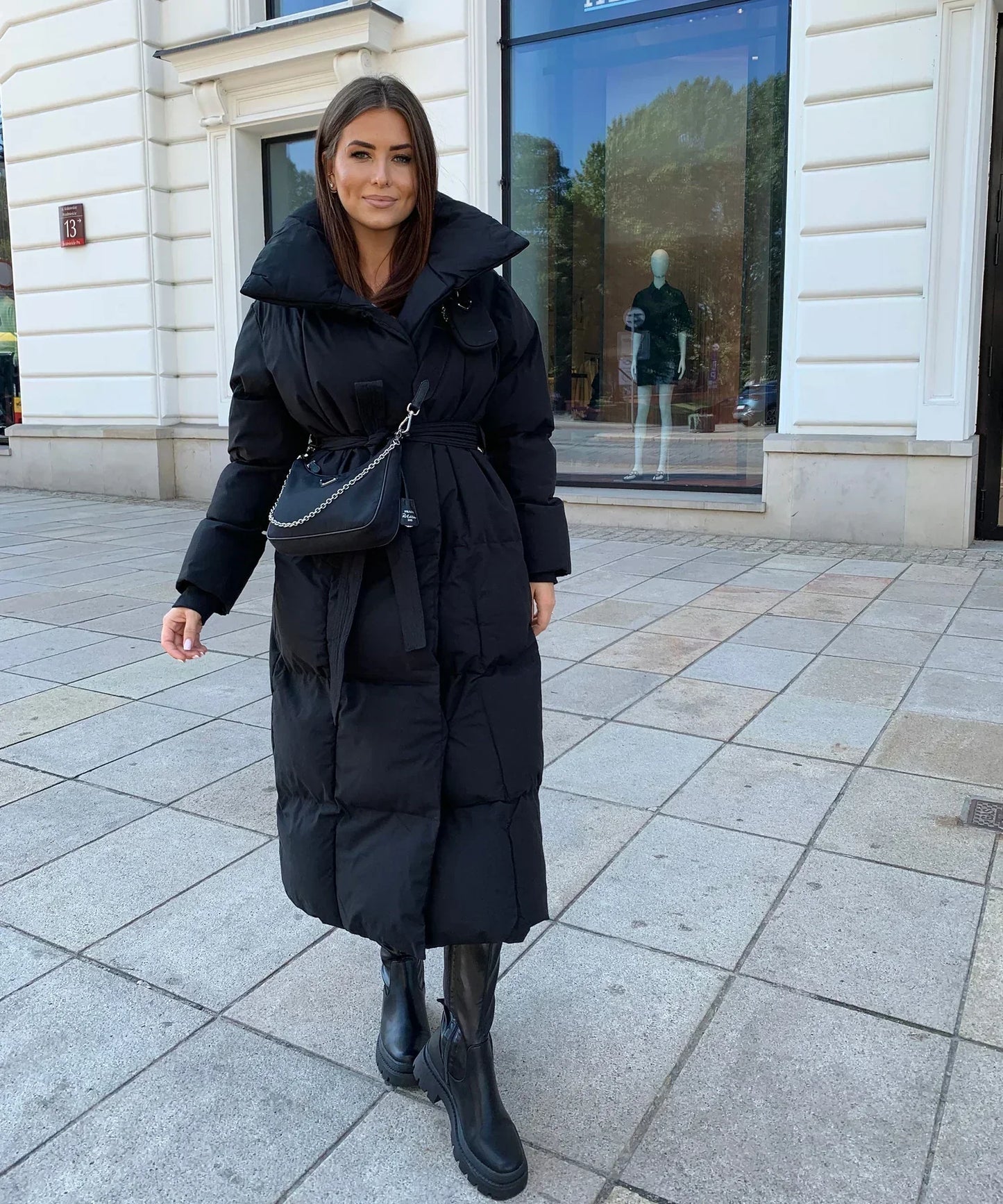 Wifey | Lange gesteppte Pufferjacke mit Gürtel