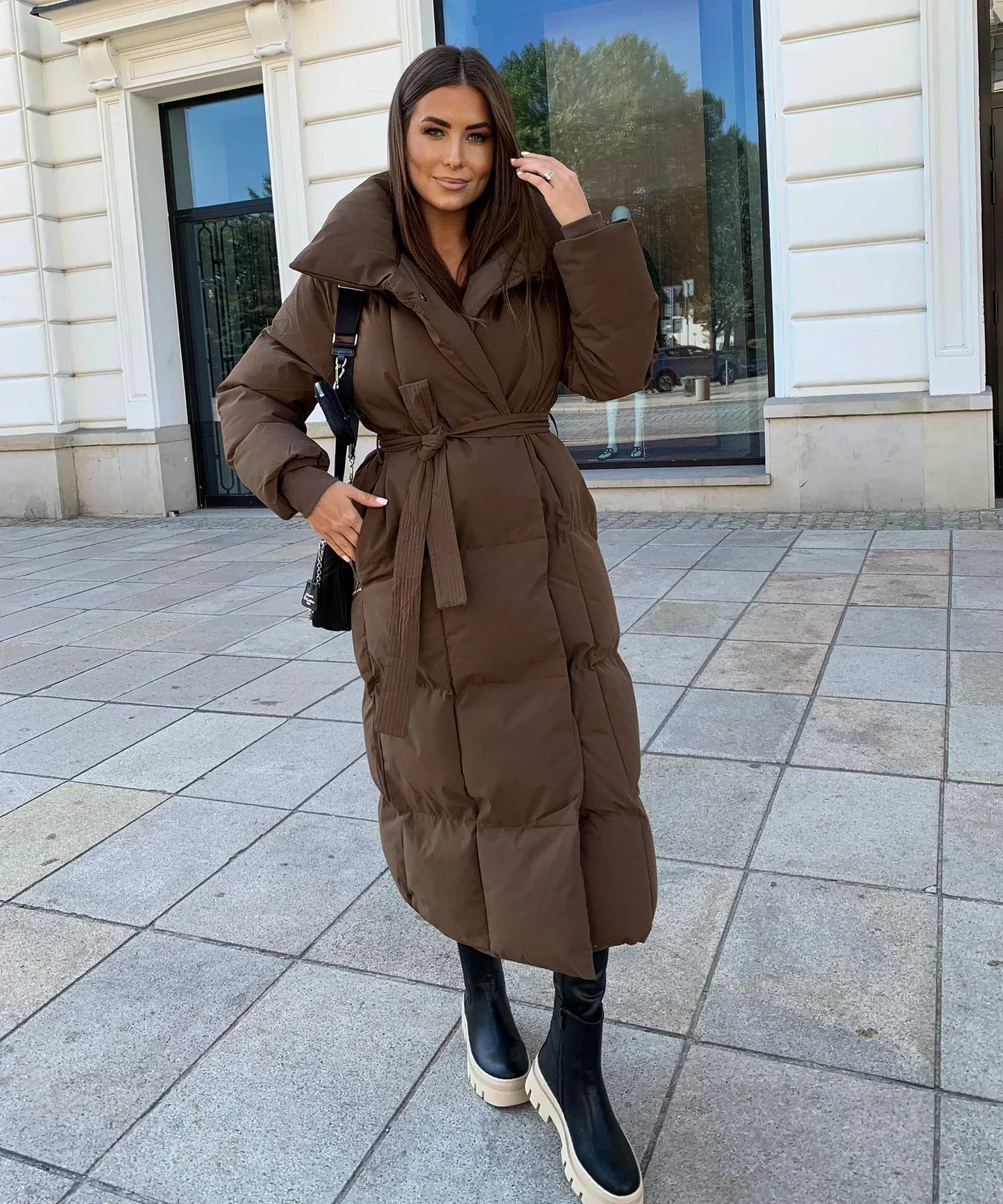 Wifey | Lange gesteppte Pufferjacke mit Gürtel